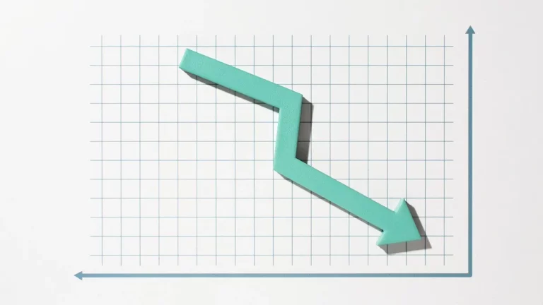 Gráfico com linha de tendência representada por uma seta verde apontando para baixo, indicando um drawdown.
